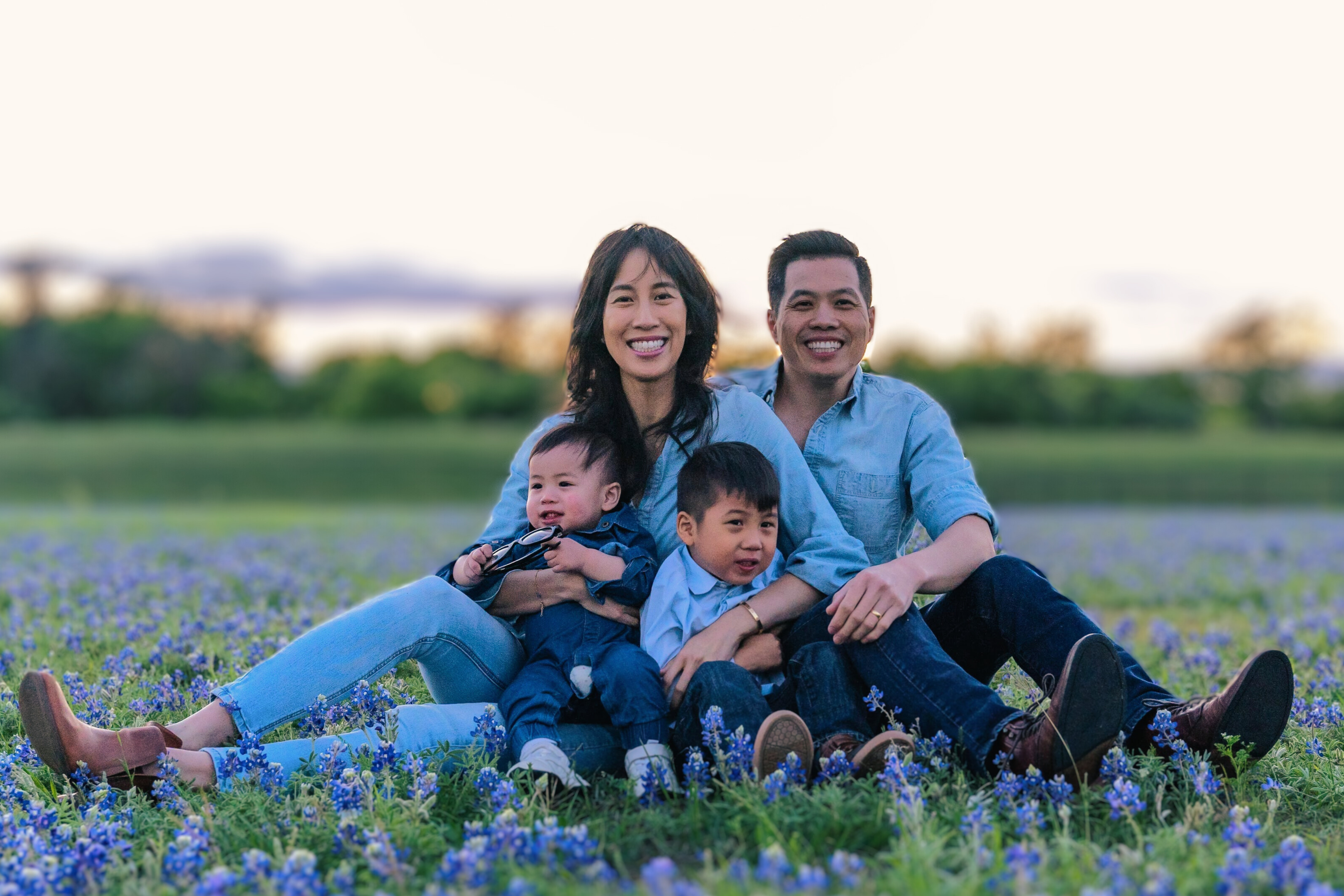 Dr. Trinh and family in the Texas bluebonnets